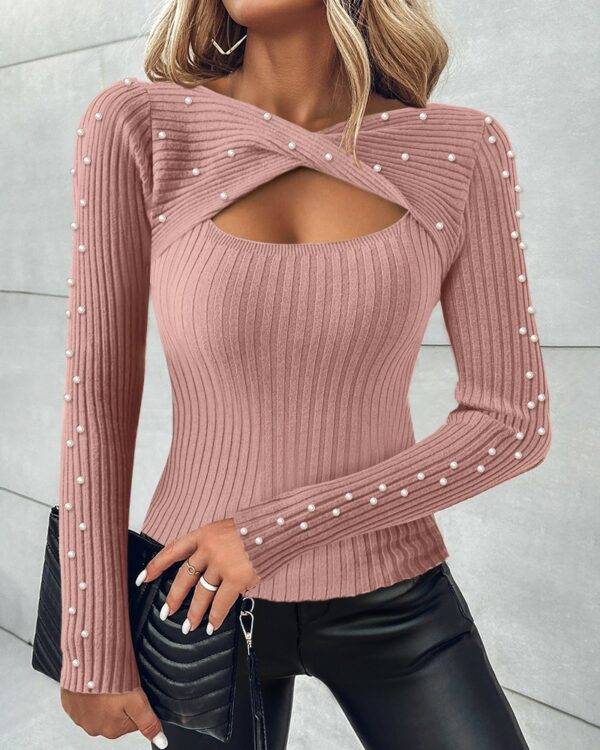 بلوزة بقصّة Slim Fit من نسيج محبوك مجوف ملتوي ومطرّزة بالخرز