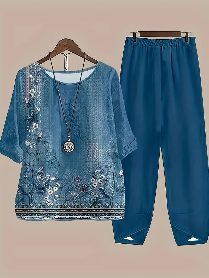 مجموعة ملابس نسائية بتصميم زهور وطباعة على قماش البوليستر المنسوج مع رقبة طاقمية غير رسمية وسراويل، مريحة وتصميم بقلاب للنساء