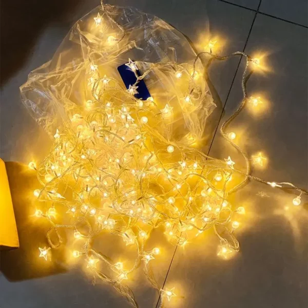 ⁦أضواء سلسلة مجيسو البيضاء الدافئة بنجوم LED⁩ - الصورة ⁦4⁩