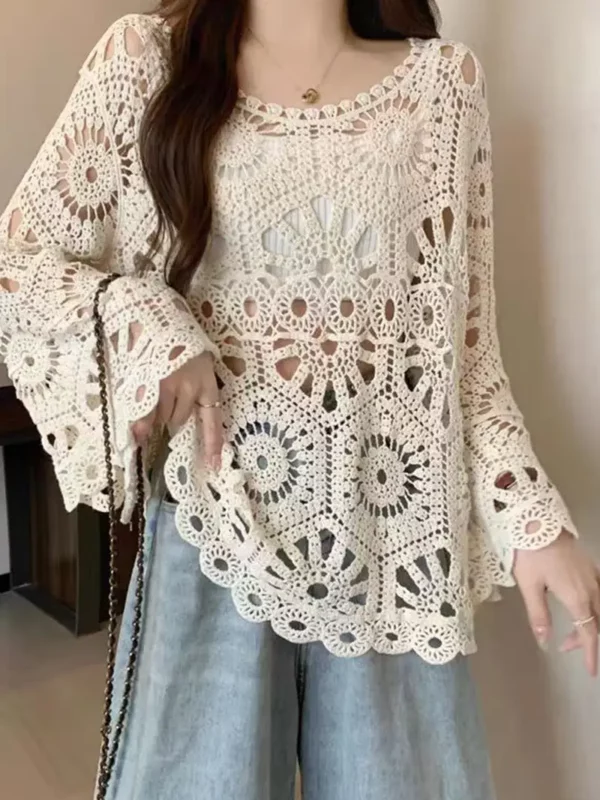 بلوزة نسائية أنيقة بأكمام طويلة ومزخرفة بفتحات