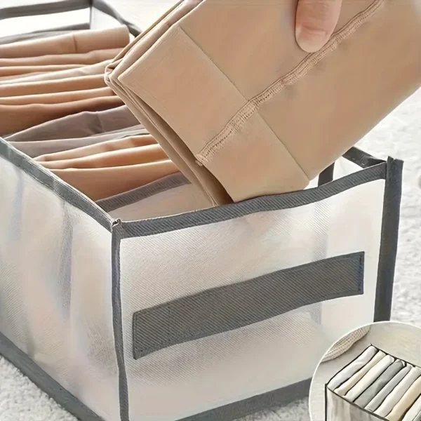 ⁦منظم ملابس قابل للطي بـ7 أقسام مع مقابض⁩ - الصورة ⁦4⁩
