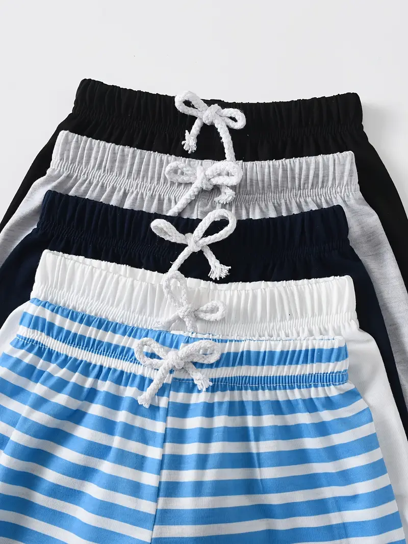 مجموعة من 5 شورتات رياضية صيفية للأولاد، مصنوعة من نسيج البوليستر المنسوج بلون صلب مع مرونة متوسطة